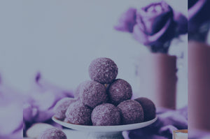 Harctic Superfoods True Arctic Superfoods blackcurrant coconut energy balls on a plate