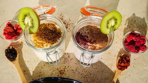 product bundles collection image with organic berry powders in a glass with yogurt and organic dried berries on a table in sunshine
